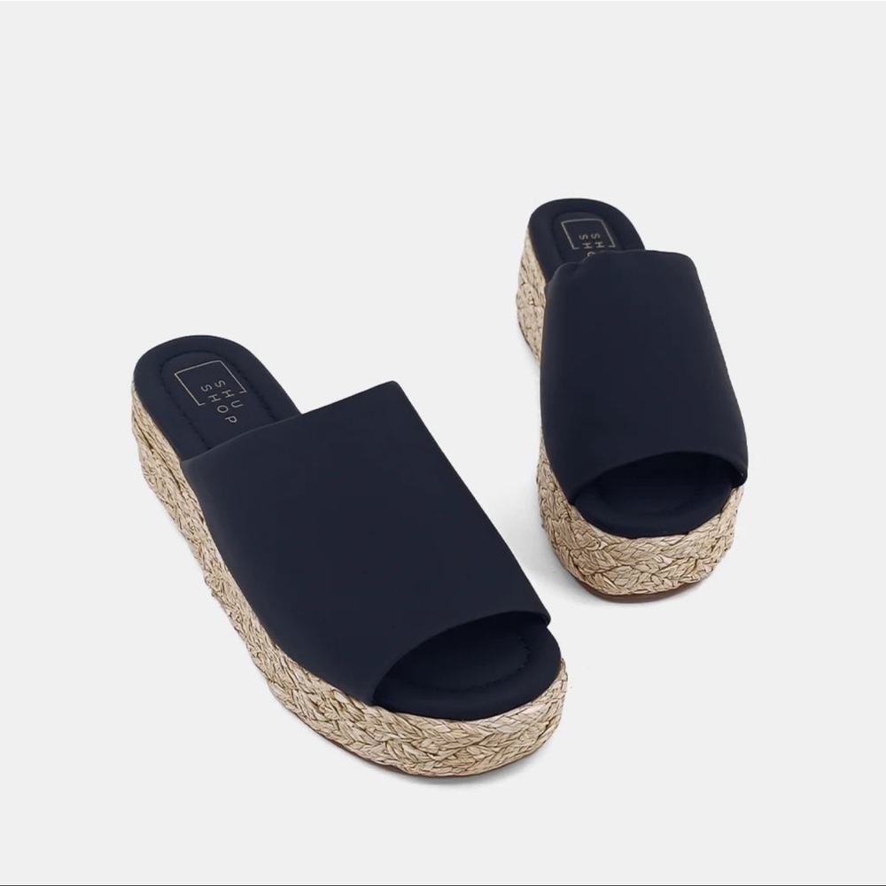 New in Box! Espadrille wedges with a black vegan leather top. Cute! And comfy